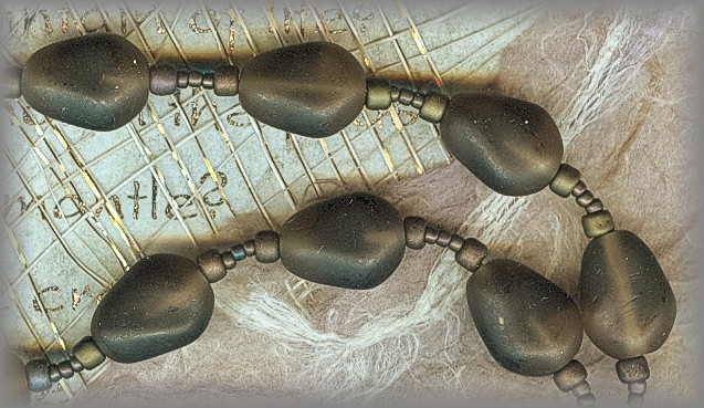 CHAPLET: rare hand pressed antique beads