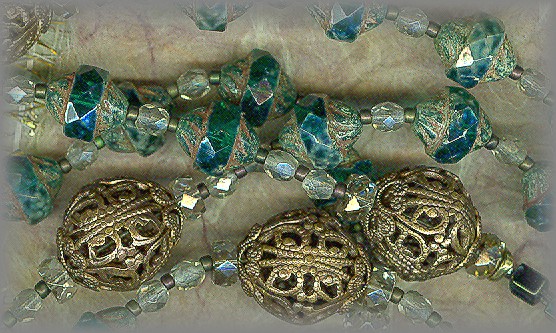 ROSARY CENTER: Cast from antique, 'Temple Offering'