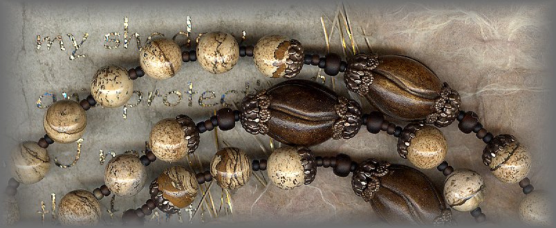 ROSARIES: closeup of jasper beads with horn