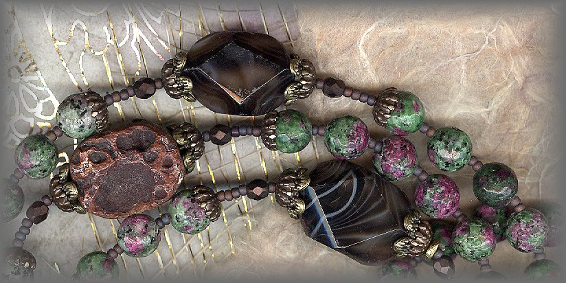 ROSARIES: closeup of Pater beads