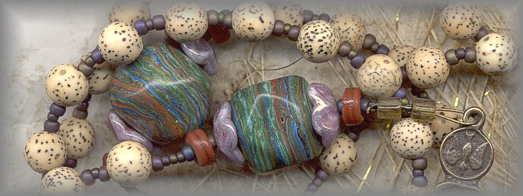 ROSARY: Natural rattan Aves will darken with use.