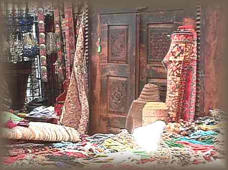 Antique carpets and furniture mingle with beads from the East
