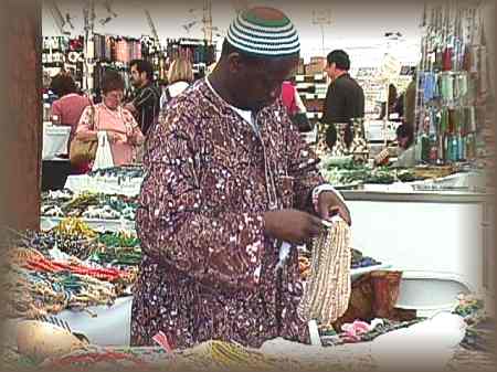 African trade beads and old chevron beads fill tables everywhere ...