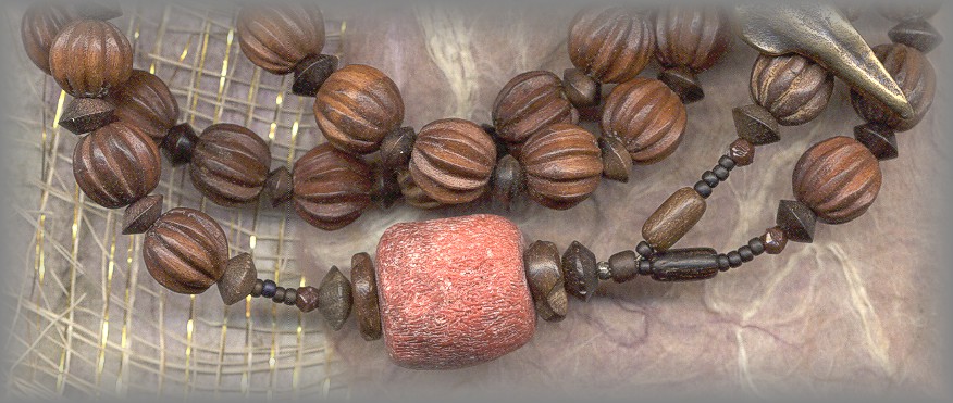 ROSARY - closeup of wood and coral rosary
