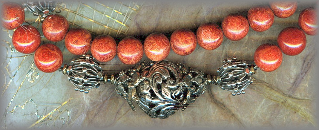 ROSARY: Silver filigree Pater beads, coral root Aves